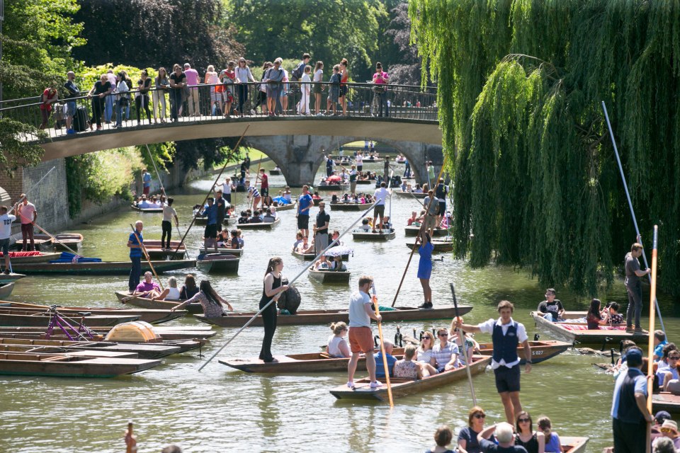  The River Cam in Cambridge is jam-packed full of punts and people enjoying messing about on the river as a heatwave picks up