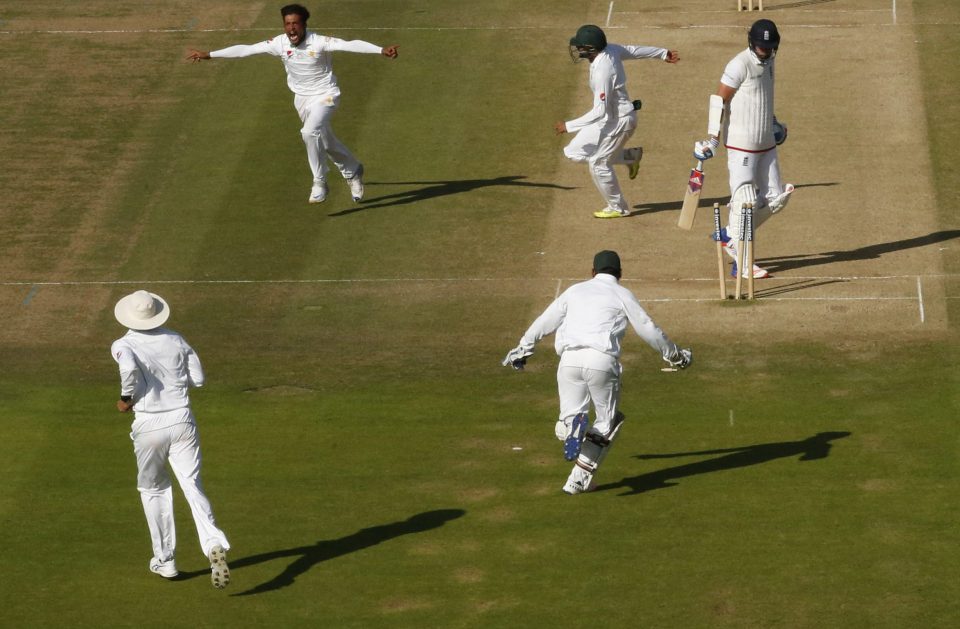 Mohammad Amir wheels away after sneaking victory on the fourth evening of the opening Test 