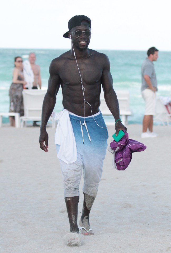  Bacary Sagna looked to have recovered from a knee injury as he took to the beach