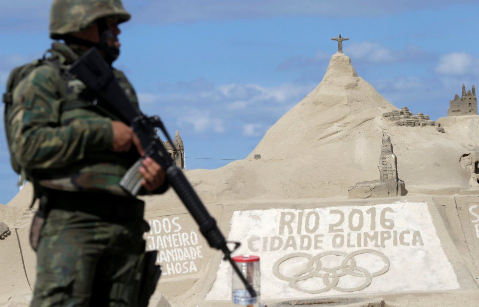 A Brazilian Army Forces soldier patrols on Copacabana beach ahead of the 2016 Rio Olympic games in Rio de Janeiro