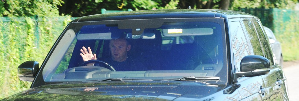 Wayne Rooney arrives at United's Carrington training ground today