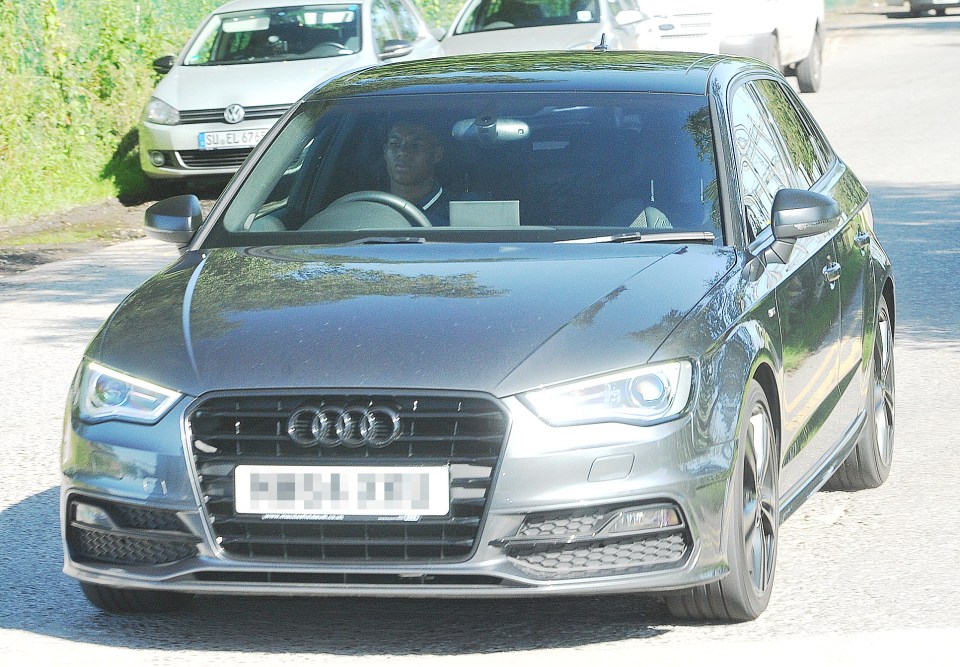 Teenager Marcus Rashford drives into Carrington in his Audi