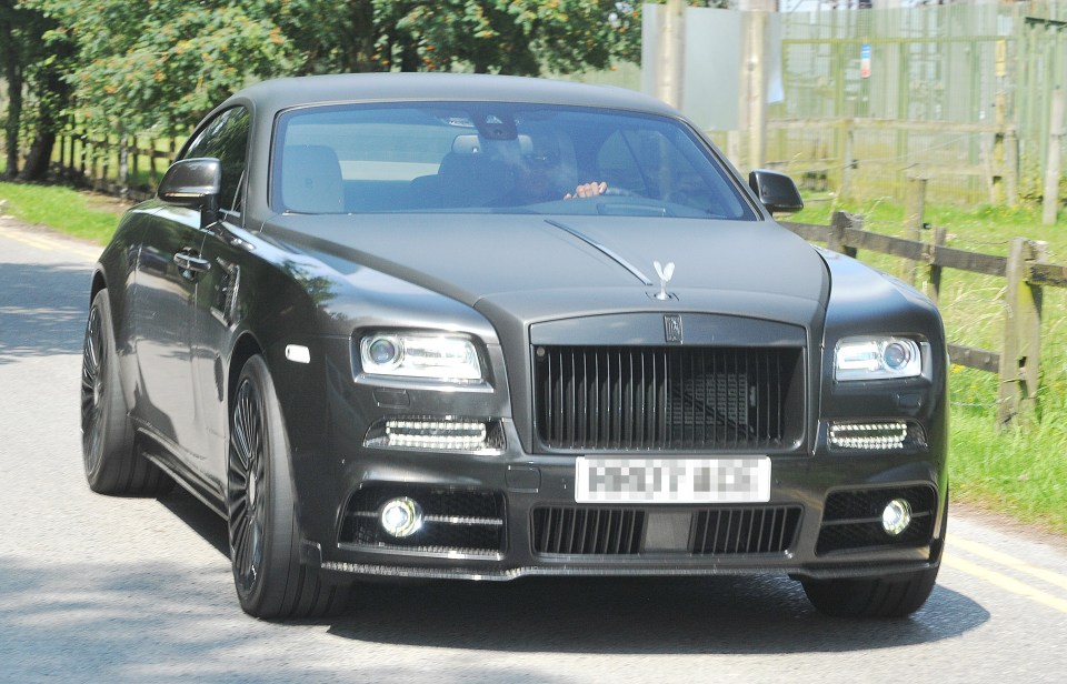 Memphis Depay drives into training in his Bentley