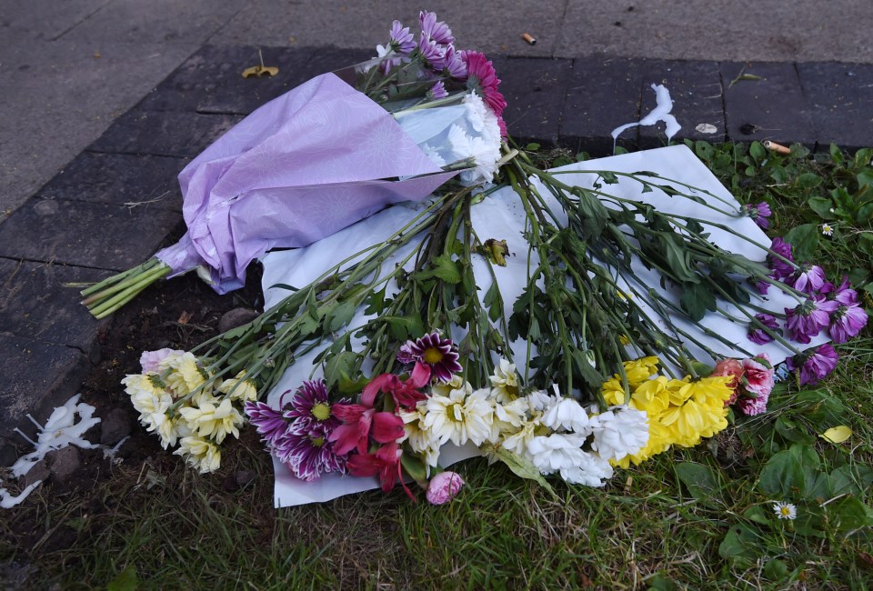 Floral tributes have been left at the scene of the tragedy 