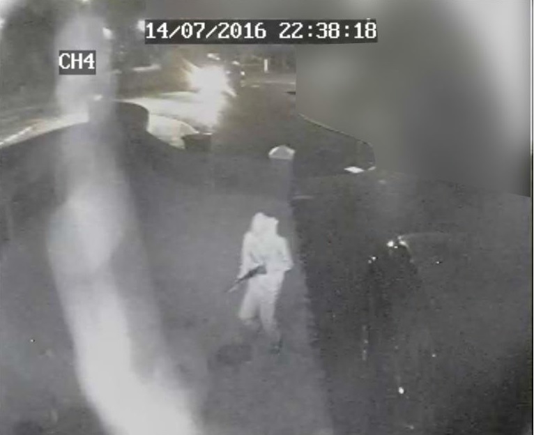  CCTV captures the moment the mystery gunman arrives at the house