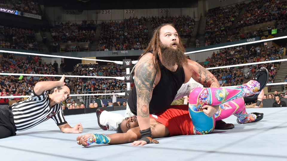 Bray Wyatt pins Xavier Woods after htting his Sister Abigail finishing move