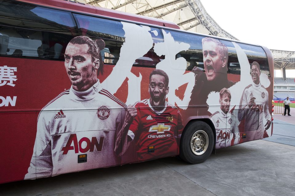 The Manchester United bus has Zlatan on the side despite his absence in China