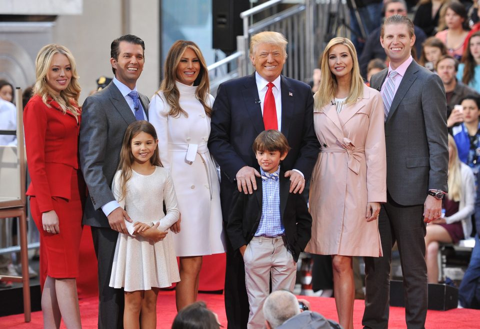  Posing with dad Donald and her half-siblings