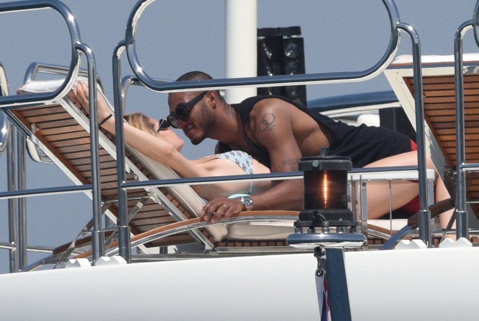 The couple looked totally loved-up onboard the boat