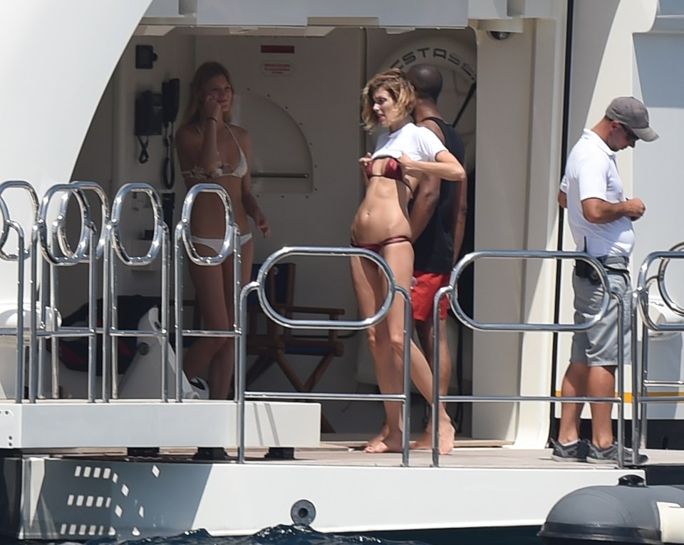 They have been relaxing on sunloungers and frolicking on the deck of the yacht