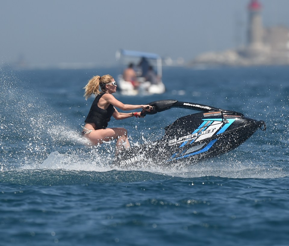 Jet skiis propelled the models across the water at high speed