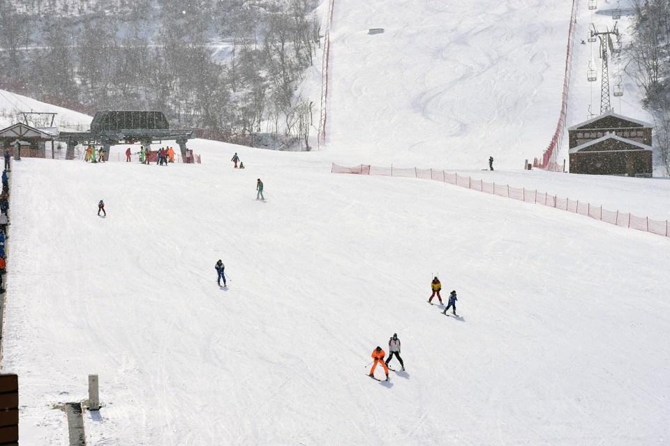  Ski and easy... British skiers take advantage of the empty slopes on a tour earlier this year