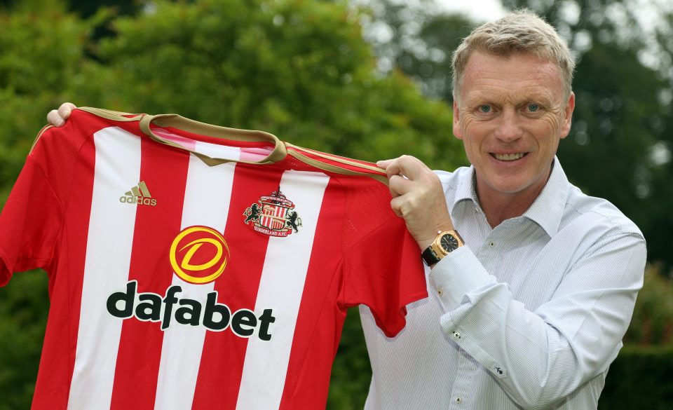 David Moyes poses with the Sunderland shirt after being named as their new manager