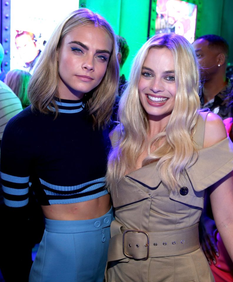  Cara Delevingne (L) and Margot Robbie