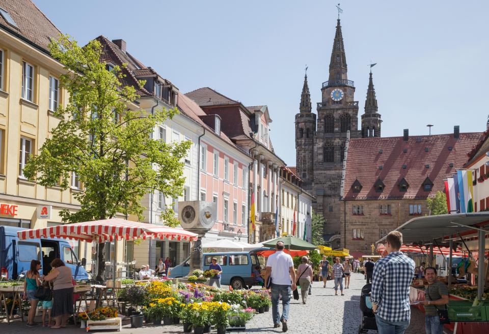 Martin Luther Platz square and the Church of St. Gumbertus, Ansbach, Bavaria, Germany