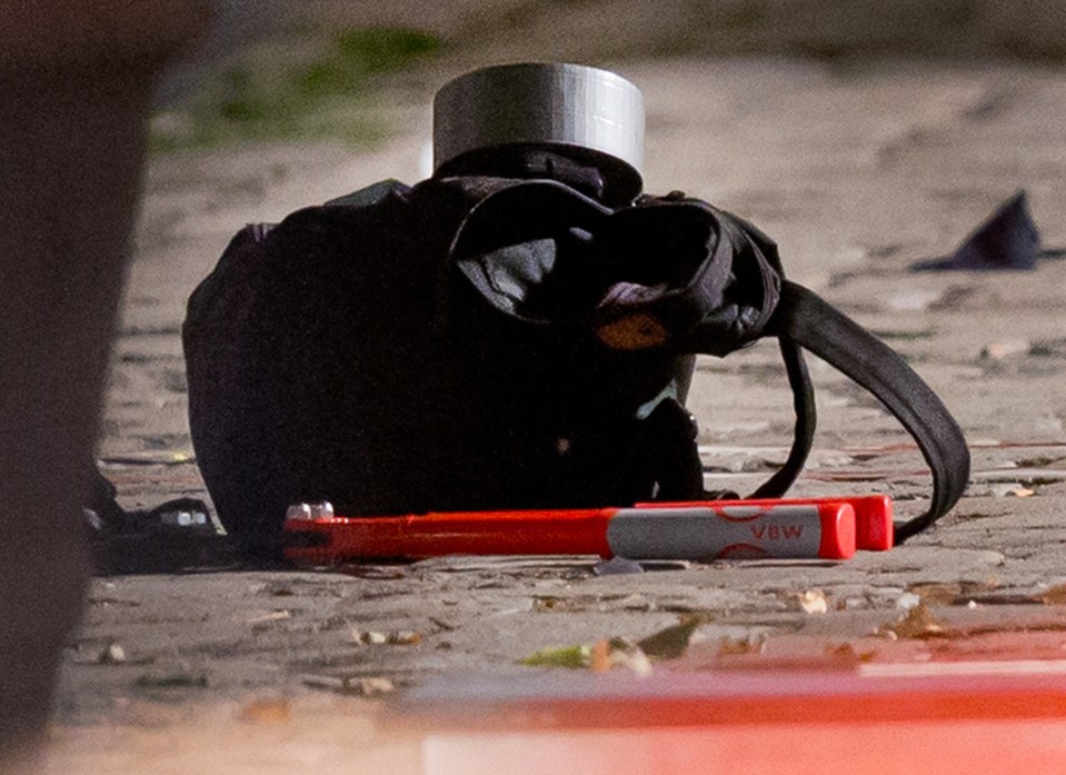 A backpack lies at the entrance of a building in Ansbach