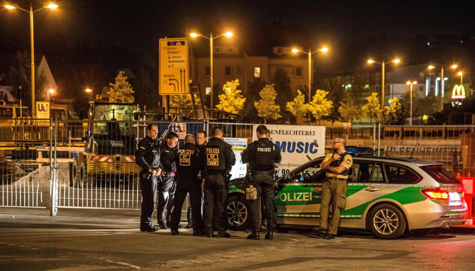 Police secure the area surrounding the crime scene after a bomb attack in Ansbach on July 25. The attacker was a refugee from Syria