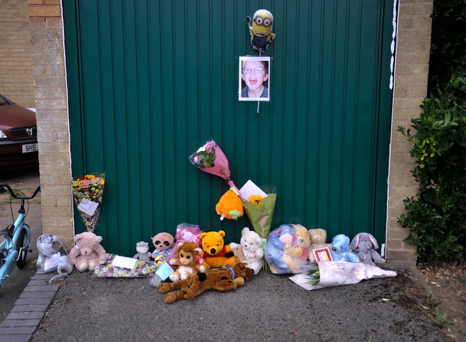 Floral tributes outside five-year-old Charlie Dunn's home in Tamworth, Staffs, 