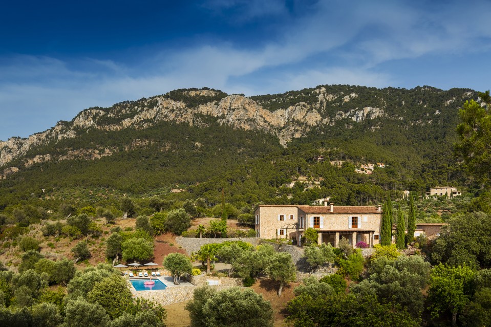 The properties are set at the base of a mountain range, offering views of stunning natural beauty