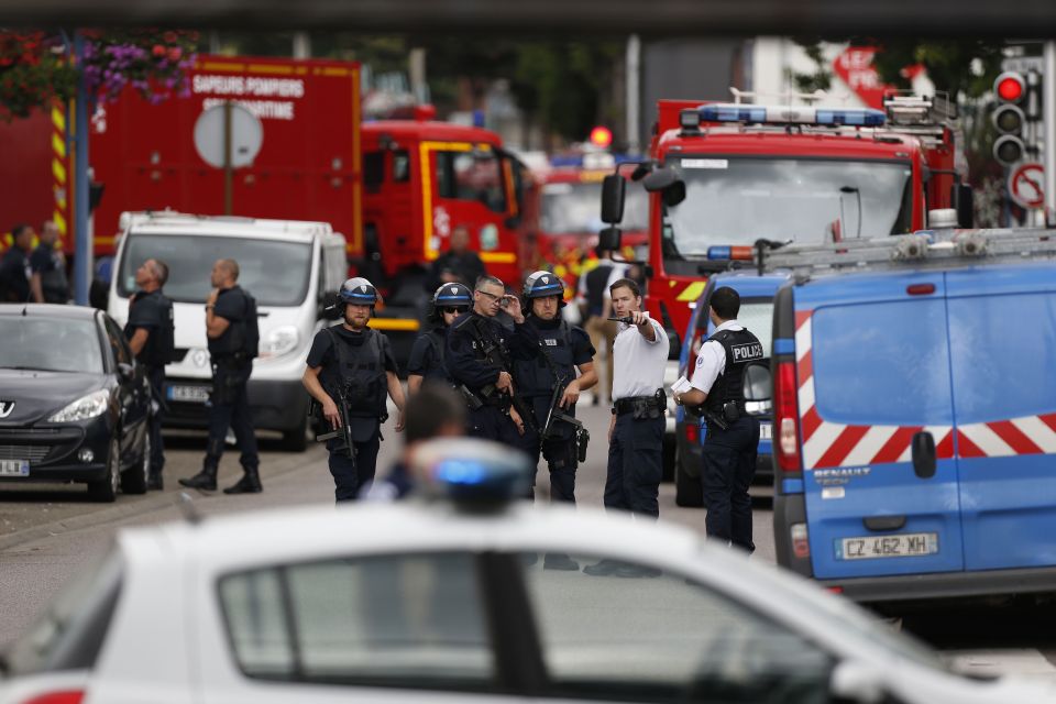 French police officers and fire engine a