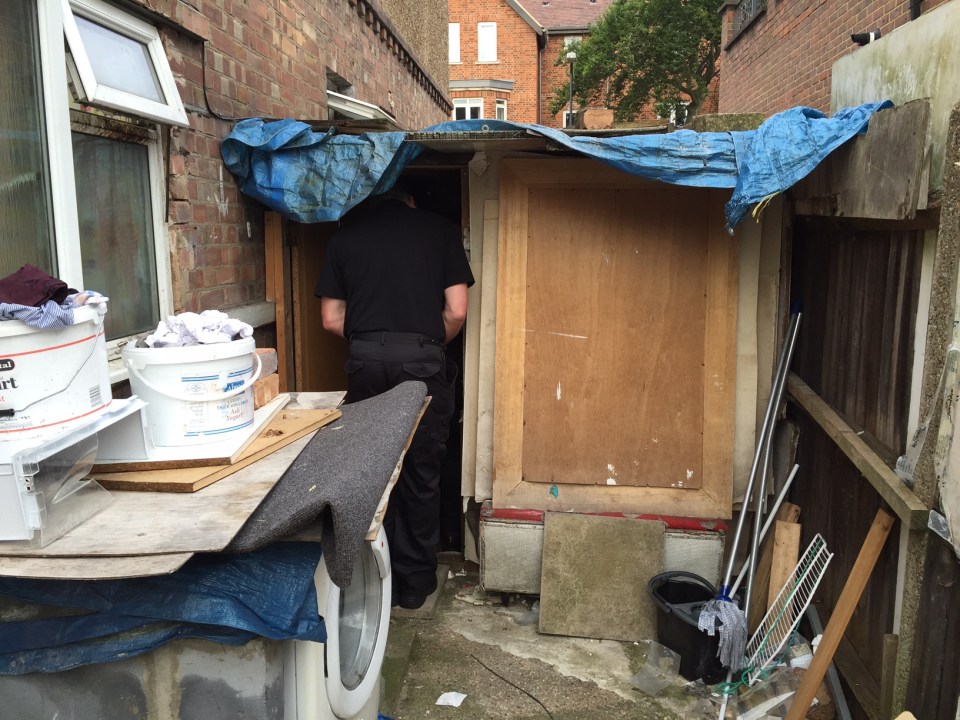  Garden shack... woman lives under tarpaulin and pallets