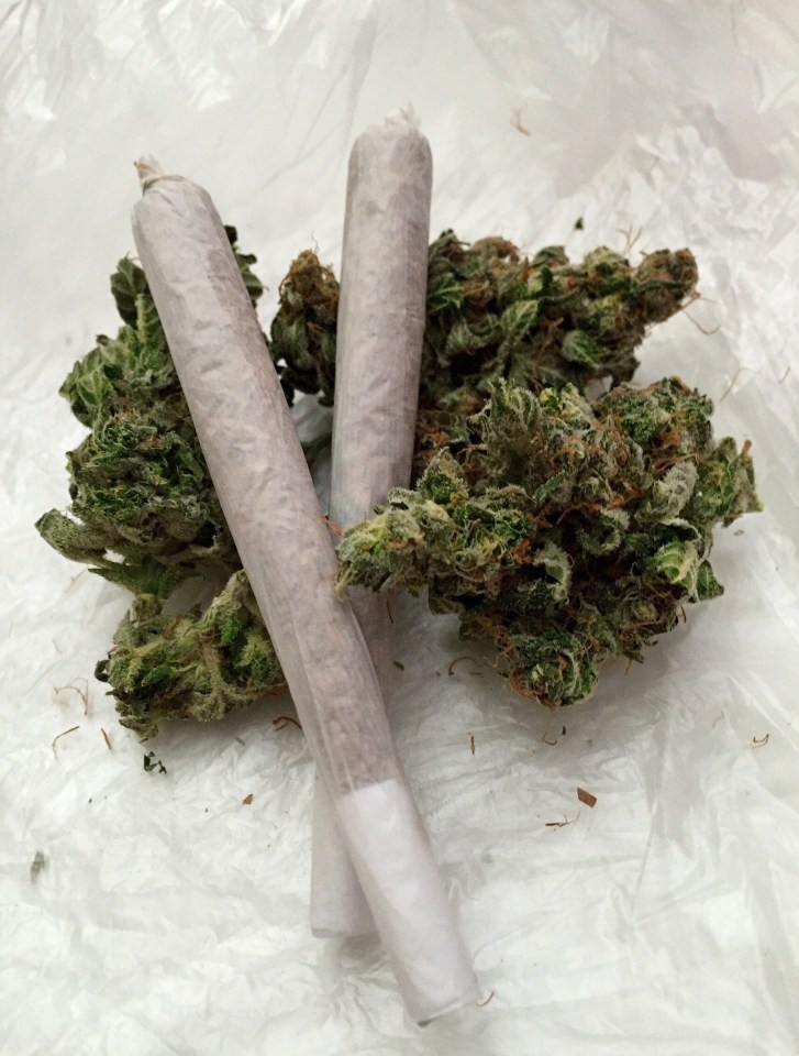 Close-Up Of Marijuana Joints On Plastic