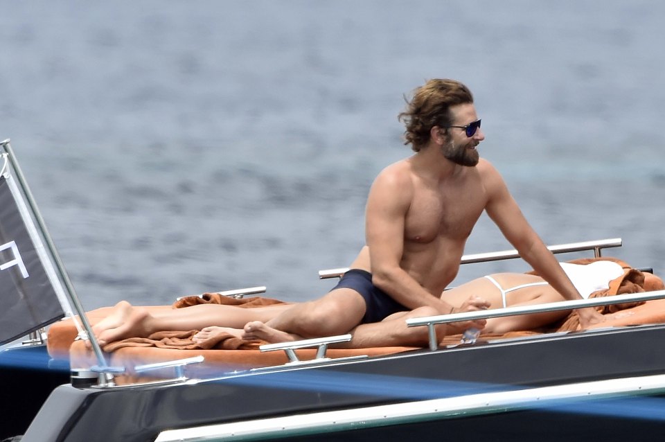 EXCLUSIVE ALL ROUNDER ***ALL FEES MUST BE AGREED***POOLED WITH XPOSURE*** Irina Shayk and Bradley Cooper enjoy each other company on a yacht in Sardinia.