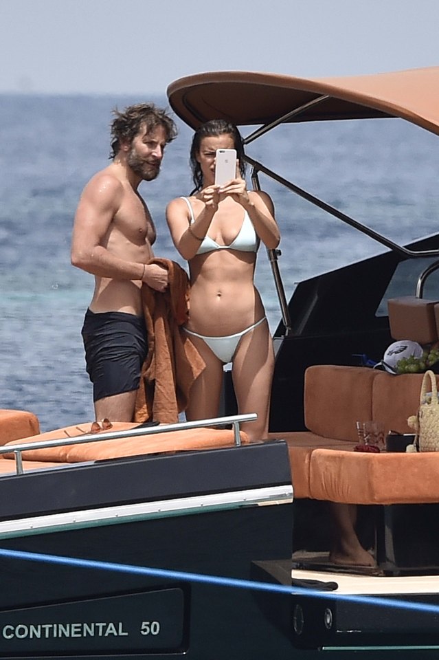 EXCLUSIVE ALL ROUNDER ***ALL FEES MUST BE AGREED***POOLED WITH XPOSURE*** Irina Shayk and Bradley Cooper enjoy each other company on a yacht in Sardinia.