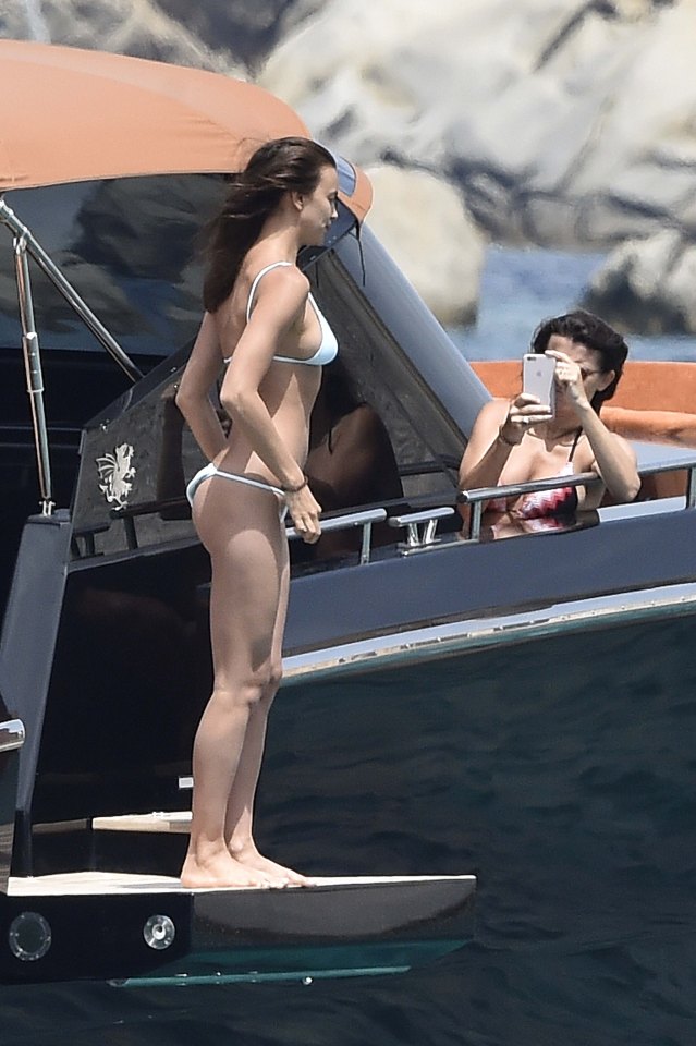 EXCLUSIVE ALL ROUNDER ***ALL FEES MUST BE AGREED***POOLED WITH XPOSURE*** Irina Shayk and Bradley Cooper enjoy each other company on a yacht in Sardinia.