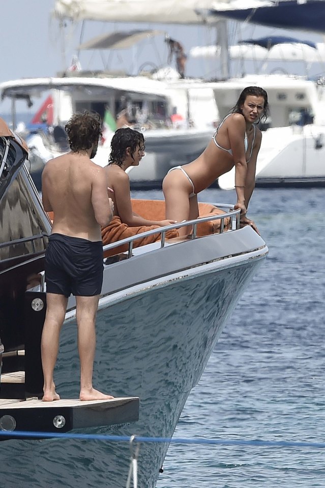 EXCLUSIVE ALL ROUNDER ***ALL FEES MUST BE AGREED***POOLED WITH XPOSURE*** Irina Shayk and Bradley Cooper enjoy each other company on a yacht in Sardinia.