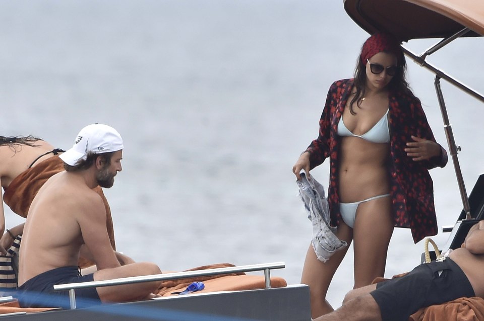 EXCLUSIVE ALL ROUNDER ***ALL FEES MUST BE AGREED***POOLED WITH XPOSURE*** Irina Shayk and Bradley Cooper enjoy each other company on a yacht in Sardinia.