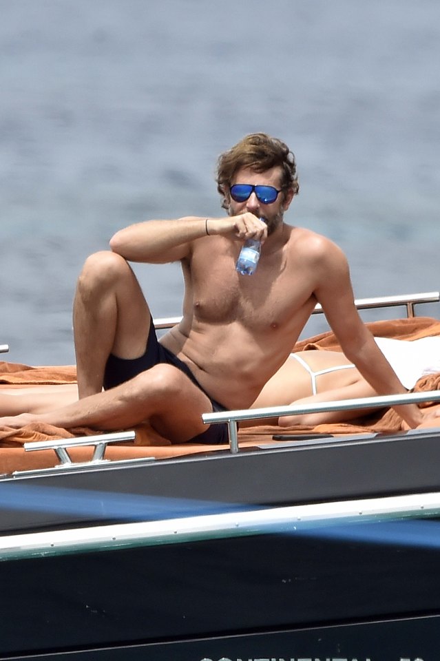 EXCLUSIVE ALL ROUNDER ***ALL FEES MUST BE AGREED***POOLED WITH XPOSURE*** Irina Shayk and Bradley Cooper enjoy each other company on a yacht in Sardinia.