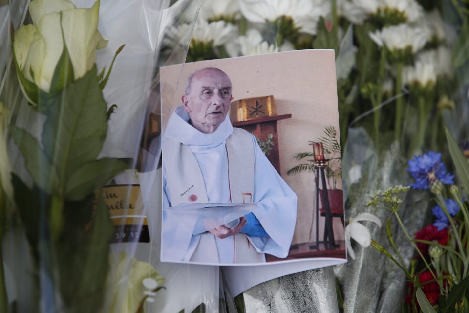  Tributes appeared today outside the church where Europe's latest terror atrocity took place