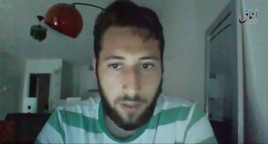  Abdel Malik Petitjean speaks to the camera in French as he urges Islamic extremists to carry out more attacks on France