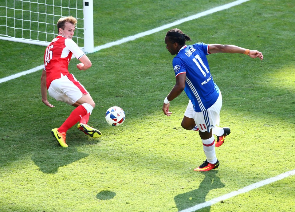  Rob Holding makes a heroic last-gasp block, but Drogba won't be denied