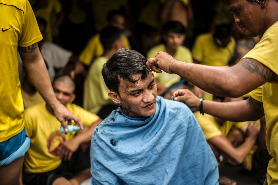  An inmate gets a haircut inside the jail which houses 3,800 men