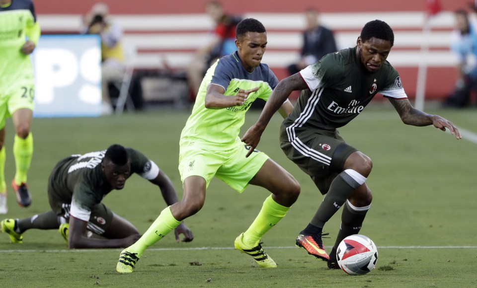 AC Milan's Luiz Adriano, right, controls the ball in front of Liverpool's Trent Alexander-Arnold during the first half of an International Champions Cup soccer match Saturday, July 30, 2016, in Santa Clara, Calif. (AP Photo/Marcio Jose Sanchez)