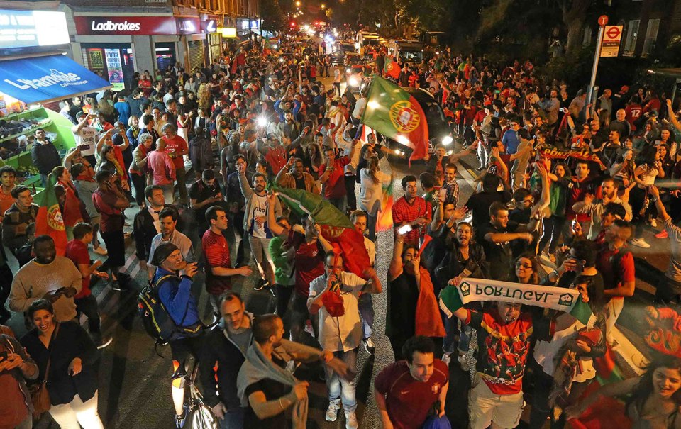  Portugal fans celebrate in Stockwell London celebrate their teams win against France in the Euro 2016 Final