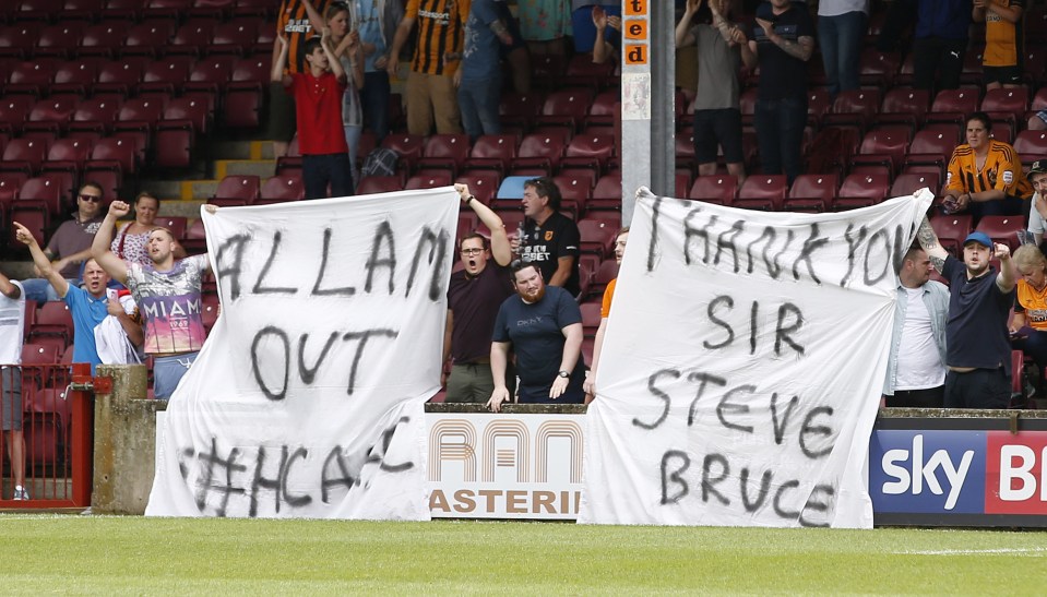  Hull fans protest against vice-chairman Ehab Allam in their friendly against Scunthorpe