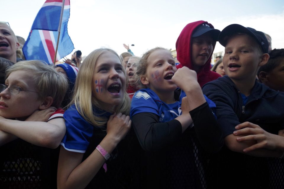  Supporters let their emotions out as Iceland return to the capital as heroes