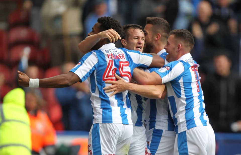  Huddersfield's victory saw them storm to top of Championship table