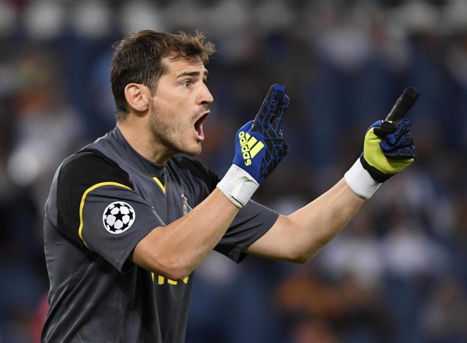  Experienced Iker Casillas barks orders at his Porto players during clash with Roma