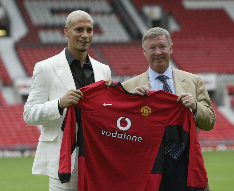  Rio Ferdinand is presented as a Manchester United player in a flashy, white suit