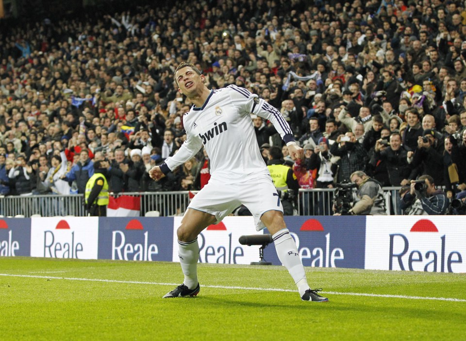 MADRID, SPAIN - DECEMBER 01: Cristiano Ronaldo of Real Madrid celebrates after scoring during the La Liga match between Real Madrid and Atletico de Madrid at Santiago Bernabeu stadium on December 1, 2012 in Madrid, Spain. (Photo by Helios de la Rubia/Real Madrid via Getty Images)