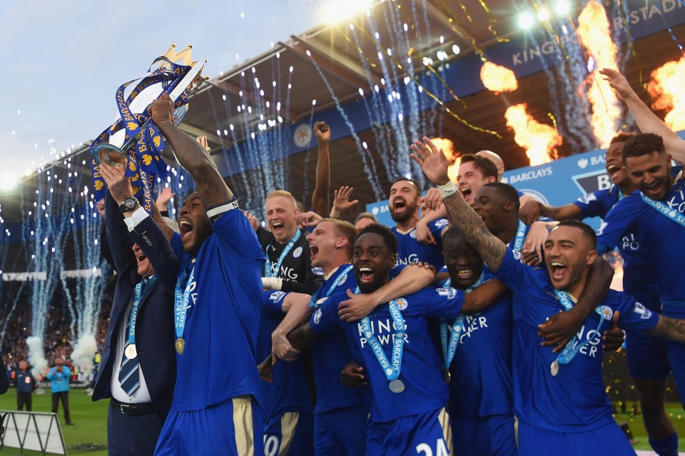 LEICESTER, ENGLAND - MAY 07: Captain Wes Morgan and manager Claudio Ranieri of Leicester City lift the Premier League Trophy after the Barclays Premier League match between Leicester City and Everton at The King Power Stadium on May 7, 2016 in Leicester, United Kingdom. (Photo by Michael Regan/Getty Images)