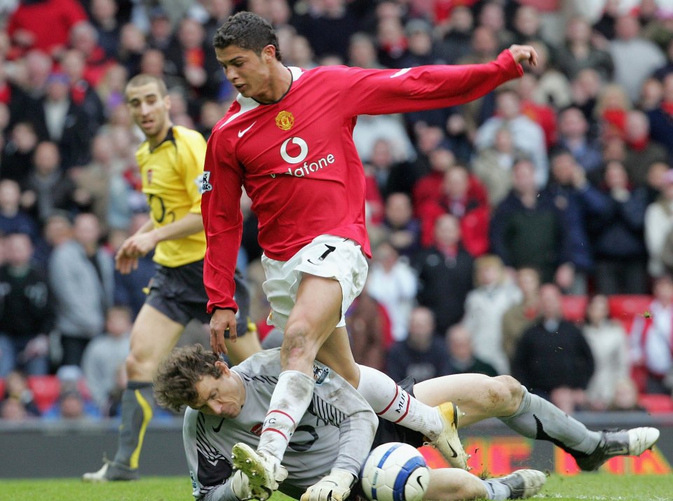 MANCHESTER, ENGLAND - APRIL 9: Cristiano Ronaldo of Manchester United clashes with Jens Lehmann of Arsenal during the Barclays Premiership match between Manchester United and Arsenal at Old Trafford on April 9 2006 in Manchester, England. (Photo by Matthew Peters/Manchester United via Getty Images)