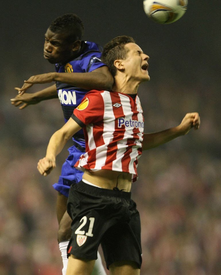 BILBAO, SPAIN - MARCH 15: Paul Pogba of Manchester United clashes with Ander Herrera of Athletic Club of Bilbao during the UEFA Europa League Round of 16 second leg match between Athletic Club of Bilbao and Manchester United at San Mames Stadium on March 15, 2012 in Bilbao, Spain. (Photo by Matthew Peters/Man Utd via Getty Images)