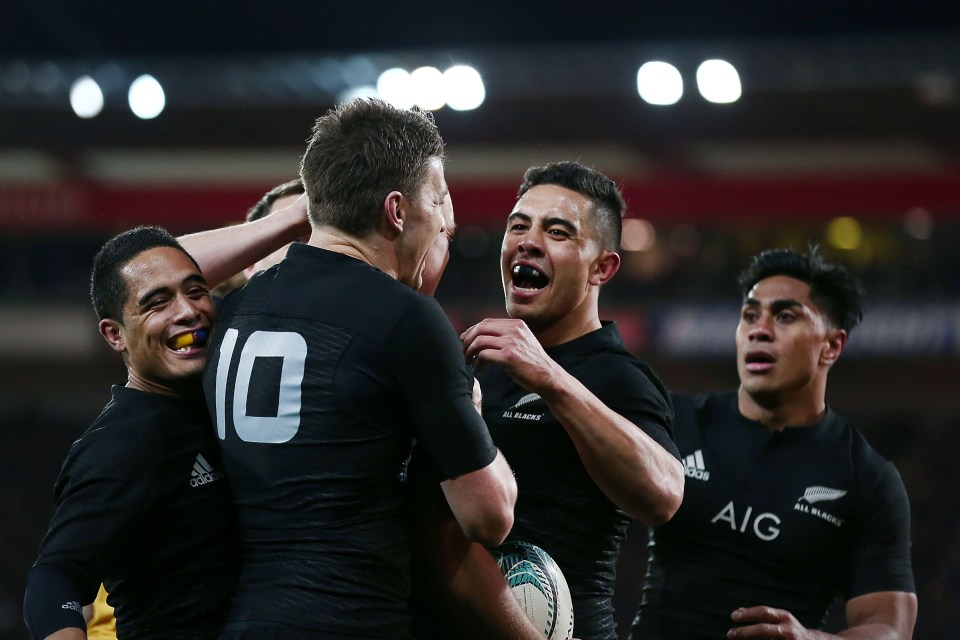 WELLINGTON, NEW ZEALAND - AUGUST 27: Anton Lienert-Brown and Beauden Barrett of New Zealand rush in to celebrate Israel Dagg's try during the Bledisloe Cup Rugby Championship match between the New Zealand All Blacks and the Australia Wallabies at Westpac Stadium on August 27, 2016 in Wellington, New Zealand. (Photo by Anthony Au-Yeung/Getty Images)