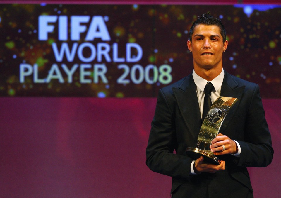 ZURICH, SWITZERLAND - JANUARY 12: Cristiano Ronaldo of Portugal holds the trophy as he wins The FIFA World Player Of The Year 2008, at the Zurich Opera House on January 12, 2009 in Zurich, Switzerland. (Photo by John Gichigi/Getty Images)