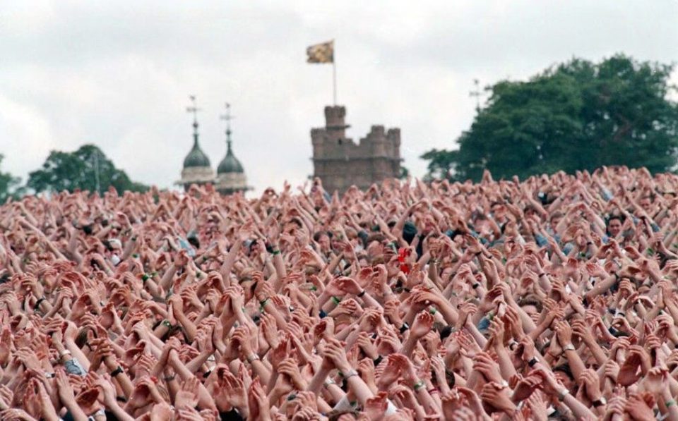 A sea of hands as far as the eye can see at knebworth Park